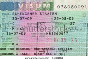 stock-photo-schengen-visa-in-passport-and-polish-customs-stamp-51581164